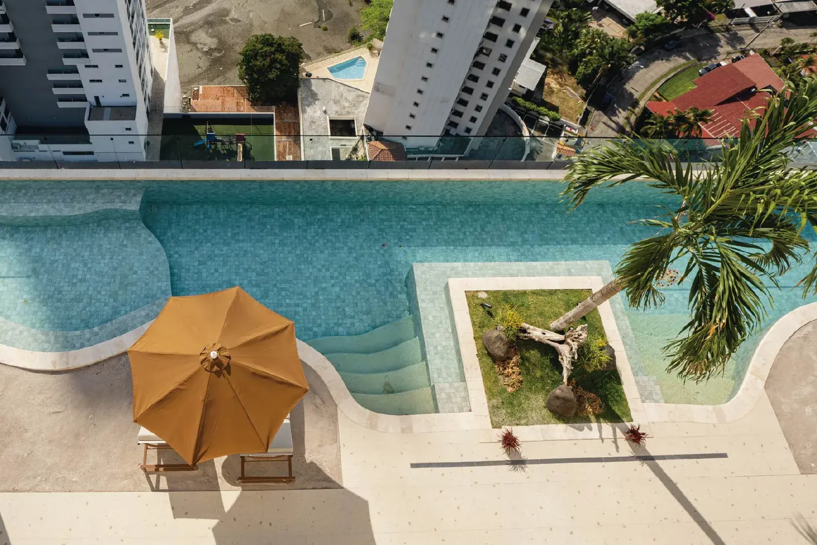 Overhead view of the Dovle Cincuentenario pool and terrace in Coco del Mar.